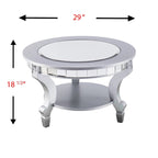 Mesa de centro redonda con espejo en plata mate, tablero de cristal y estante inferior